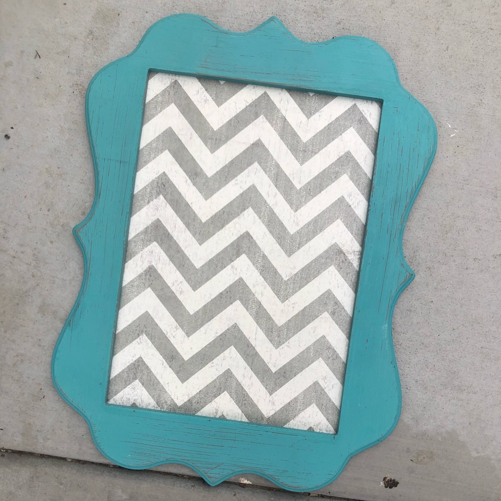 Turquoise frame with magnet background.